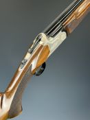 Escort 12 bore over and under ejector shotgun with engraved lock, underside, trigger guard, top