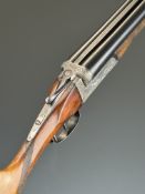 Spanish 12 bore side by side shotgun with engraved dogs to the locks and birds to the underside,