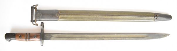United States WW1 M1917 bayonet with wooden handle and 43cm fullered blade, in original scabbard.