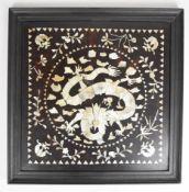 Chinese mother of pearl inlaid panel decorated with a five clawed dragon, 40 x 39cm
