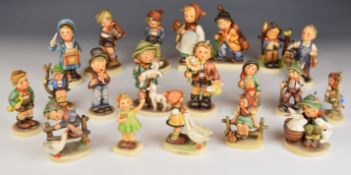 Twenty Goebel Hummel figures including Goose Girl, Barnyard Hero and Forever Yours, tallest 14cm