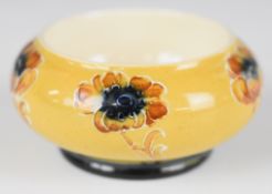 Macintyre early Moorcroft design pedestal miniature dish or salt decorated in the Poppy pattern,