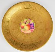 Royal Worcester painted fruit cabinet plate with heavily gilded surround, signed Shinnie, diameter