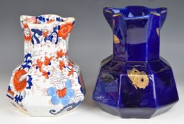 Two Mason's jugs with serpent handles, including a mazarine example with butterfly decoration,