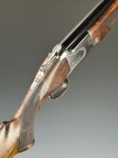 Browning 325 Grade II 12 bore over and under ejector shotgun with named and engraved locks,