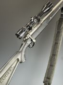Ruger Model 77/22 .22 semi-automatic rifle with named composite stock, multi-shot magazine, padded