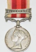 Indian Mutiny Medal 1858 with clasp for Lucknow, name erased but 1st Battalion 20th Foot remains