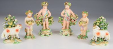 Six 19thC Derby and Chelsea style putti and lambs with flowers, tallest 13cm