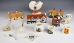 Goss houses, cottages and crested ware including Isle of Wight, Winchester, St Bees etc, tallest