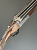 Victor Sarasquetta 12 bore side by side ejector shotgun with named and engraved locks, engraved