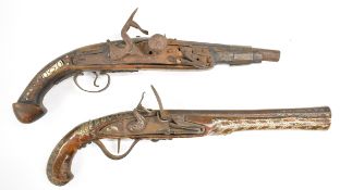 Two eastern flintlock pistols each with studded or inlaid decoration and one with bone