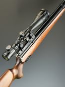 Air Arms S310 .22 PCP air rifle with chequered semi-pistol grip, raised cheek piece, adjustable