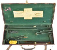 Westley Richards & Co brass and leather bound double shotgun carry case with fitted interior and '