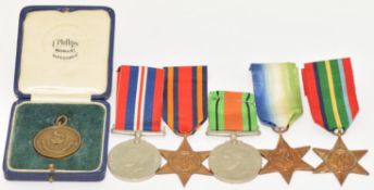 Five WW2 medals comprising Pacific Star, Burma Star, Atlantic Star, Defence Medal and War Medal,