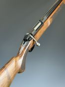Tikka M595 .222 Remington bolt-action rifle with chequered semi-pistol grip and forend, sling mounts