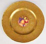 Royal Worcester painted fruit cabinet plate with heavily gilded surround, signed Price, diameter