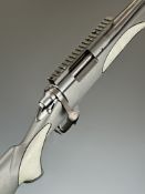 Remington Model 700 .223 bolt-action rifle with composite stock, textured semi-pistol grip and
