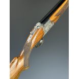 Browning B25 FCS Diana 12 bore over and under ejector shotgun with engraved scenes of birds to the