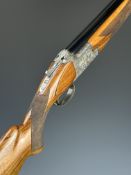 Browning B25 FCS Diana 12 bore over and under ejector shotgun with engraved scenes of birds to the