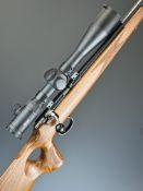 Anschutz Model 1417 .22 bolt-action rifle with chequered thumb-hole grip and forend, raised cheek