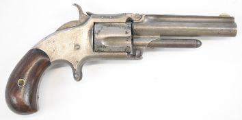 Smith & Wesson .32 rimfire five-shot single-action revolver with sheath trigger, shaped wooden grips