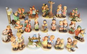Twenty Goebel Hummel figures, the majority double figures including Letter to Santa Claus,