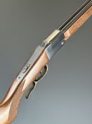 Falco 9mm side by side folding poacher's shotgun with chequered semi-pistol grip and forend, sling
