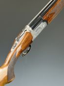Lincoln 12 bore over and under ejector shotgun with engraved scenes of dogs and birds to the