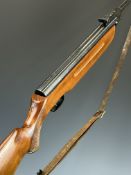 Weihrauch HW35 .22 air rifle with chequered semi-pistol grip, raised cheek piece, leather sling
