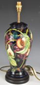 Moorcroft table lamp decorated in the Queen's Choice pattern, H54cm