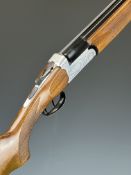 Midland 12 bore over and under shotgun with engraved locks, underside, trigger guard, top plate