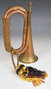 Copper and brass bugle with coloured rope and tassels, overall length 28cm