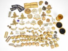 Collection of British Army badges, buttons and insignia including First Surrey Rifles, Royal Signals