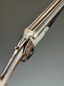 Franchi 12 bore side by side ejector shotgun with engraved scenes of deer to the locks, engraved