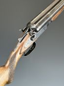 Baikal T03-66 12 bore side by side hammer action shotgun with engraved scenes of birds and dogs to