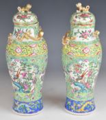 Pair of 19thC Chinese famille verte covered vases with enamelled decoration of flora and fauna and