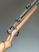 Beeman Power Series Model 1338 .22 PCP air rifle with semi-pistol grip, raised cheek piece, two 10-