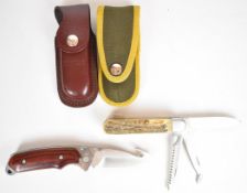 Two pocket knives comprising Buck USA with wooden grip and Lindner 440 Rostfrei multi-tool with stag