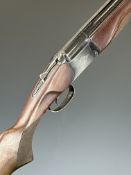 Baikal NX-27E-1C 12 bore over and under ejector shotgun with engraved locks and trigger guard,