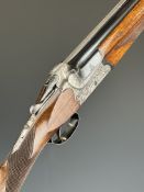 AYA Coral 12 bore over and under ejector shotgun with heavily carved action featuring scenes of dogs