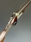 Winchester 12 bore side by side ejector shotgun with named and engraved lock, engraved underside,