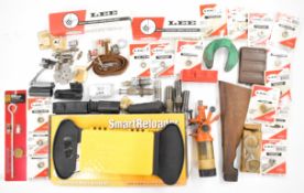 A collection of shotgun or rifle re-loading tools and accessories including Lee .433 and .395 bullet