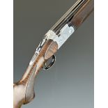 Beretta Model S687 Sporting 12 bore over and under ejector shotgun with engraved scenes of birds