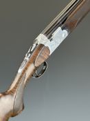 Beretta Model S687 Sporting 12 bore over and under ejector shotgun with engraved scenes of birds