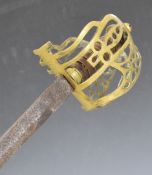 Broad sword with brass basket hilt, wooden grips with copper wire and 88cm straight blade. PLEASE
