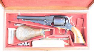 Navy Arms .36 six-shot single action percussion revolver with brass trigger guard, shaped wooden