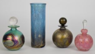Four pieces of Isle of Wight and Mdina glass comprising three scent bottles and a vase, all signed
