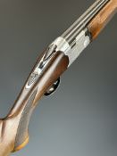 Beretta S685E 12 bore over and under ejector shotgun with engraved lock, underside, trigger guard,