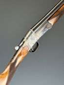 British .410 single barrelled folding poacher's shotgun with chequered grip and forend and 25.25