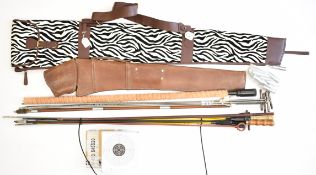 Gun cleaning rods, two gun slips, targets and other shooting accessories